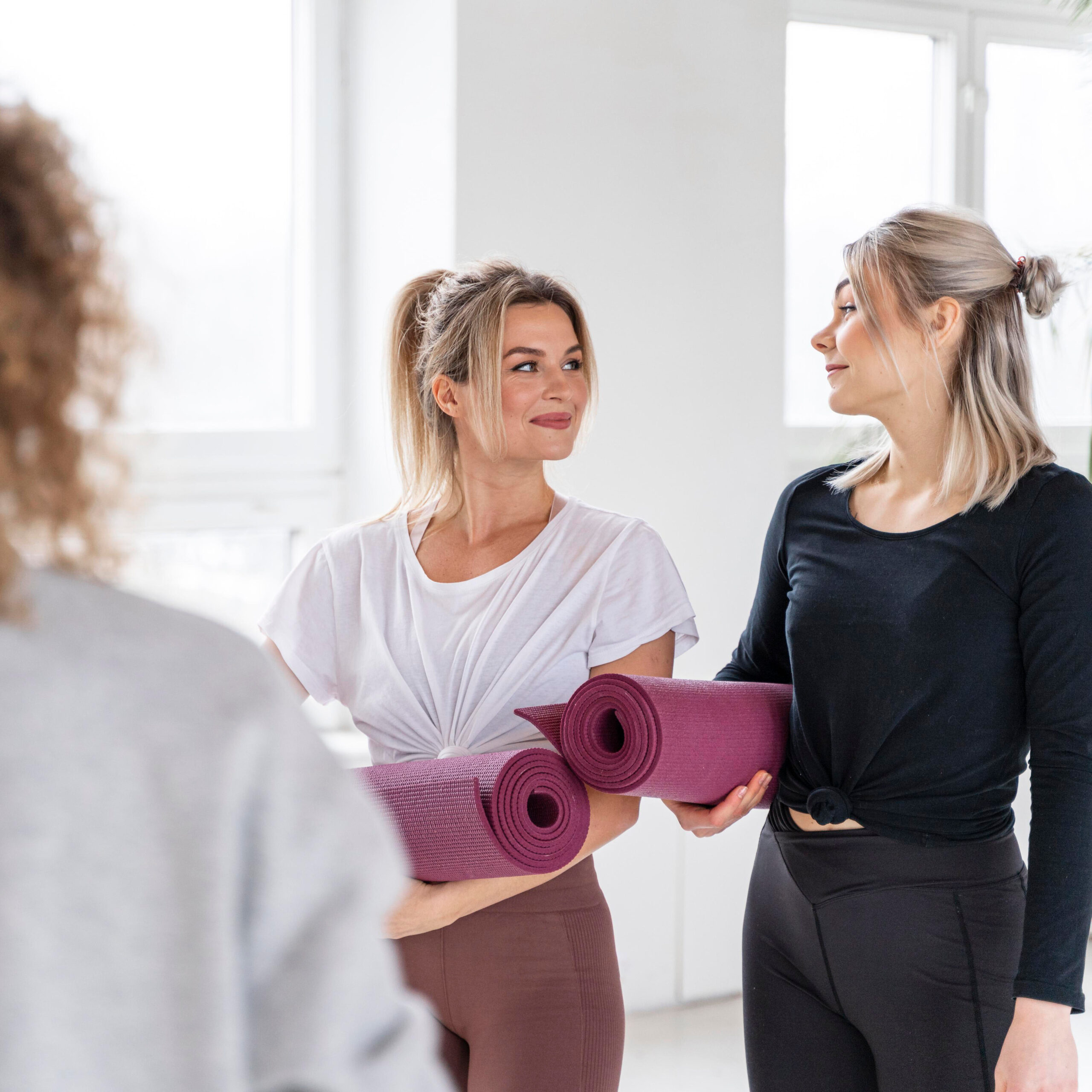 Ladies with yoga mats